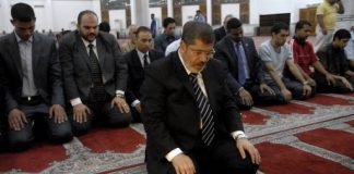 Mohammad Morsi (August 8, 1951- June 17, 2019) the fifth elected President of Egypt (June 30, 2012 – July 3, 2013) leading prayer (Photo: AFP: 2012)