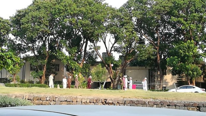 Children enjoying playing football in capital of Pakistan